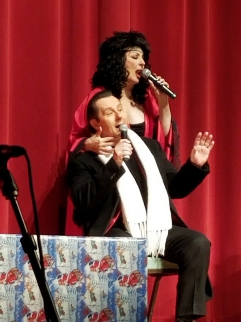 Two people singing together